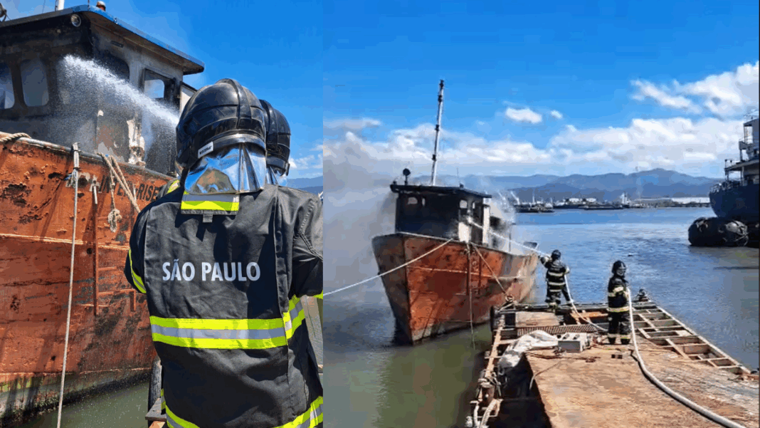 Bombeiros de São Paulo combatem incêndio em embarcação atracada em marina, usando mangueiras para resfriar a estrutura.