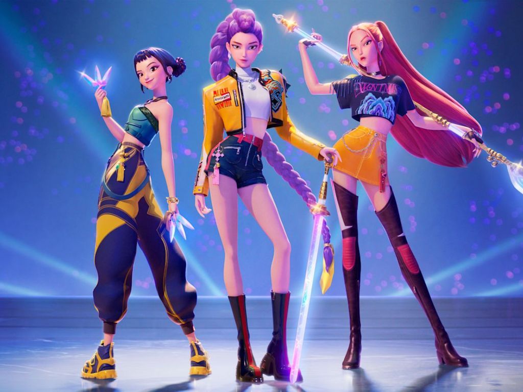 Animação de três mulheres em um fundo azul. Cada uma segura uma espécie de arma na mão.