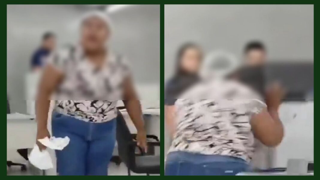 Imagem desfocada de mulher que quebrou equipamentos em agência da concessionária elétrica do Piauí. (Foto: reprodução/redes sociais)