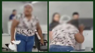 Imagem desfocada de mulher que quebrou equipamentos em agência da concessionária elétrica do Piauí. (Foto: reprodução/redes sociais)