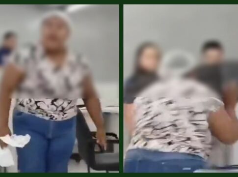 Imagem desfocada de mulher que quebrou equipamentos em agência da concessionária elétrica do Piauí. (Foto: reprodução/redes sociais)