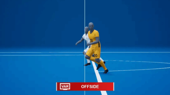 Impedimento semiautomático sendo executado, com o atacante a frente do defensor