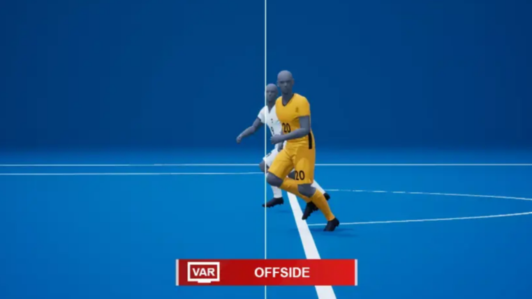 Impedimento semiautomático sendo executado, com o atacante a frente do defensor