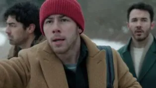 A imagem mostra os irmãos Jonas, Joe, Nick e Kevin, no filme de Natal do Disney +