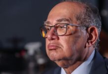 Ministro Gilmar Mendes (STF) com expressão neutra
