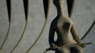 Estátua em frente à fachada do STF