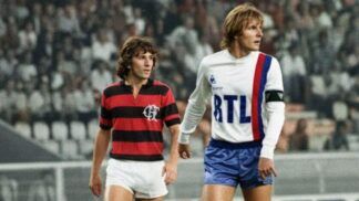 Imagem mostra dois jogadores de futebol, um do Flamengo e outro do PSG.