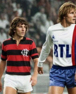 Imagem mostra dois jogadores de futebol, um do Flamengo e outro do PSG.