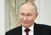 Vladimir Putin, presidente da Rússia, sorrindo