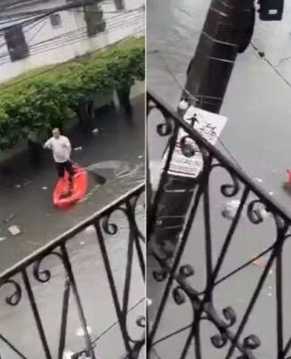 Homem pratica stand-up paddle em rua alagada de Fortaleza; veja vídeo