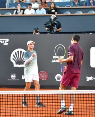 João Fonseca e sua dupla Marcelo Melo no Rio Open