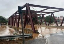 Alagamento subiu e encobriu ponte em Juiz de Fora