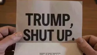 A mensagem "Trump, cale a boca" aparece escrita em inglês numa folha de papel