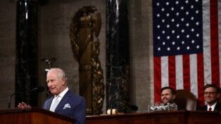 U.S. Vice President JD Vance and U.S. House Speaker Mike Johnson (R-LA) listen as Britain's King Charles addresses a joint meeting of Congress in the House Chamber of the U.S. Capitol in Washington, D.C., U.S., April 28, 2026. Henry Nicholls/Pool via REUTERS
