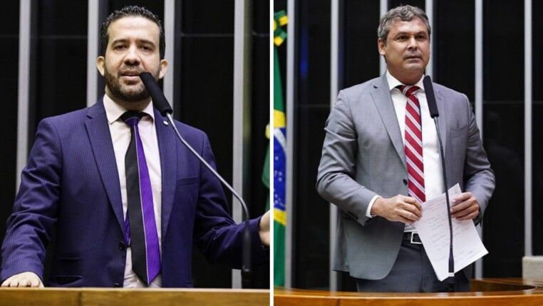 Deputados falam ao microfone durante sessão na Câmara