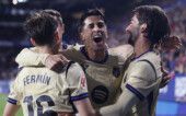 Soccer Football - LaLiga - Osasuna v FC Barcelona - El Sadar Stadium, Pamplona, Spain - May 2, 2026 FC Barcelona's Ferran Torres celebrates scoring their second goal with teammates REUTERS/Vincent West