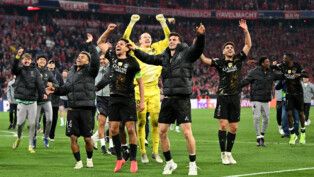 Soccer Football - UEFA Champions League - Semi Final - Second Leg - Bayern Munich v Paris St Germain - Allianz Arena, Munich, Germany - May 6, 2026 Paris St Germain's Desire Doue, Marquinhos, Matvey Safonov and Fabian Ruiz celebrate after reaching the UEFA Champions League final REUTERS/Angelika Warmuth