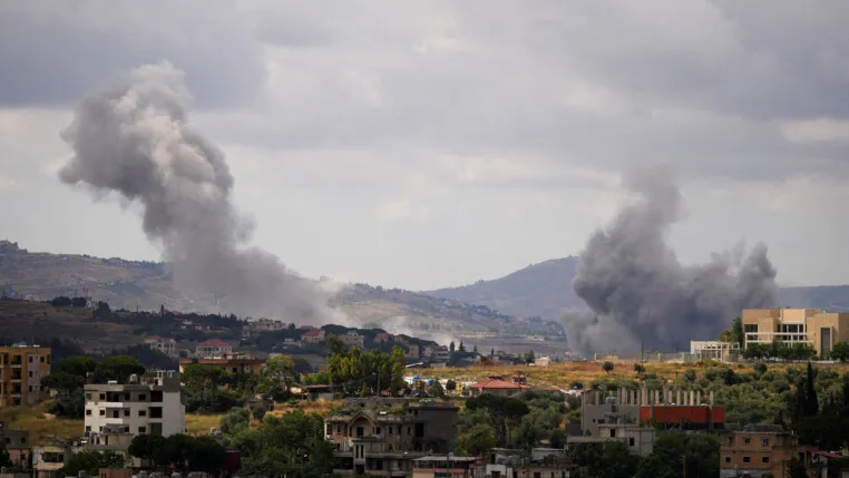 Smoke billows from southern Lebanon, following Israeli strikes, as seen from Nabatieh, Lebanon, June 14, 2026. REUTERS/Stringer TPX IMAGES OF THE DAY