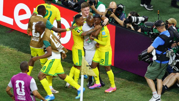 Soccer Football - FIFA World Cup 2026 - Group A - South Africa v South Korea - Estadio Monterrey, Monterrey, Mexico - June 24, 2026 South Africa's Thapelo Maseko celebrates scoring their first goal with teammates REUTERS/Raquel Cunha