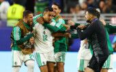 Soccer Football - FIFA World Cup 2026 - Group J - Jordan v Algeria - San Francisco Bay Area Stadium, Santa Clara, California, U.S. - June 22, 2026 Algeria's Nadhir Benbouali celebrates scoring their first goal with teammates REUTERS/Eloisa Lopez