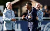 FILE PHOTO: Soccer Football - World Cup - UEFA Qualifiers - France Training - INF Clairefontaine, Clairefontaine-en-Yvelines, France - September 1, 2025 France's Kylian Mbappe reacts with coach Didier Deschamps and assistant coach Guy Stephan during training REUTERS/Benoit Tessier/File Photo