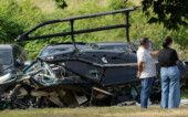 Parts of a helicopter lie on the ground following a collision between two helicopters in Rio de Janeiro People stand near parts of a helicopter lying on the ground following a deadly collision between two helicopters in Rio de Janeiro, Brazil, June 14, 2026. REUTERS/Ricardo Moraes