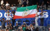 Soccer Football - FIFA World Cup 2026 - Group G - Iran v New Zealand - Los Angeles Stadium, Inglewood, California, U.S. - June 15, 2026 Iran fans display a pre-Iranian Revolution "Lion and Sun" flag in the stands REUTERS/Matthew Childs
