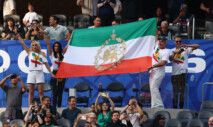 Soccer Football - FIFA World Cup 2026 - Group G - Iran v New Zealand - Los Angeles Stadium, Inglewood, California, U.S. - June 15, 2026 Iran fans display a pre-Iranian Revolution "Lion and Sun" flag in the stands REUTERS/Matthew Childs