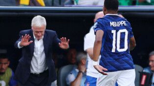 Soccer Football - FIFA World Cup 2026 - Round of 32 - France v Sweden - New York New Jersey Stadium, East Rutherford, New Jersey, U.S. - June 30, 2026 France's Kylian Mbappe with coach Didier Deschamps after being substituted IMAGN IMAGES via Reuters/Vincent Carchietta