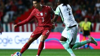 Soccer Football - International Friendly - Portugal v Nigeria - Estadio Dr. Magalhaes Pessoa, Leiria, Portugal - June 10, 2026 Portugal's Cristiano Ronaldo in action with Nigeria's Calvin Bassey REUTERS/Rodrigo Antunes