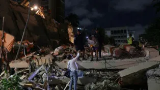Emergency services work at the site of a collapsed building after an earthquake, in Caracas, Venezuela, June 24, 2026. REUTERS/Gaby Oraa