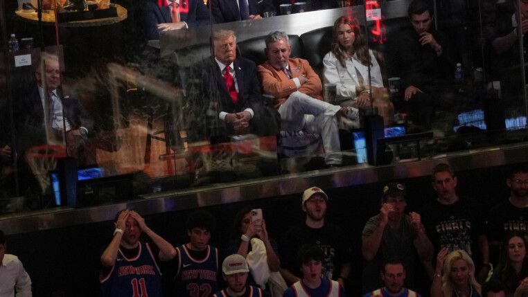 U.S. President Donald Trump and James Dolan attend Game 3 of the NBA playoffs at Madison Square Garden in New York City, New York, U.S., June 8, 2026. REUTERS/Nathan Howard