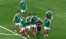 Soccer Football - FIFA World Cup 2026 - Group A - Mexico v South Africa - Estadio Azteca, Mexico City, Mexico - June 11, 2026 Mexico's Cesar Montes reacts after being shown a red card by referee Wilton Pereira Sampaio as teammates protest REUTERS/Raquel Cunha