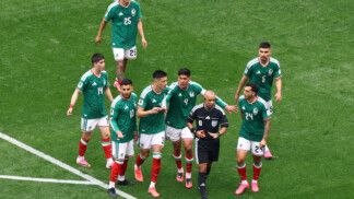 Soccer Football - FIFA World Cup 2026 - Group A - Mexico v South Africa - Estadio Azteca, Mexico City, Mexico - June 11, 2026 Mexico's Cesar Montes reacts after being shown a red card by referee Wilton Pereira Sampaio as teammates protest REUTERS/Raquel Cunha