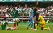 Soccer Football - FIFA World Cup 2026 - Group A - Mexico v South Africa - Estadio Azteca, Mexico City, Mexico - June 11, 2026 South Africa's Sphephelo Sithole is shown a red card by referee Wilton Sampaio REUTERS/Hannah Mckay