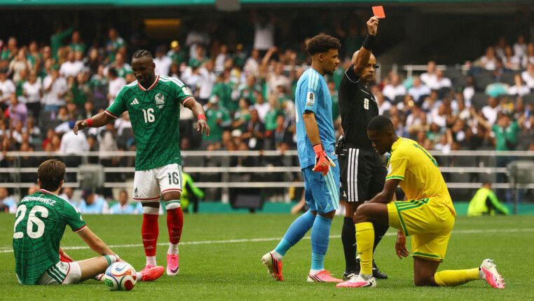 Soccer Football - FIFA World Cup 2026 - Group A - Mexico v South Africa - Estadio Azteca, Mexico City, Mexico - June 11, 2026 South Africa's Sphephelo Sithole is shown a red card by referee Wilton Sampaio REUTERS/Hannah Mckay