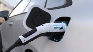The electric car is fully charged with a battery, Charging technology, Clean energy filling technology. 3D illustration