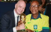 O ex-zagueiro Brito e Gianni Infantino, presidente da Fifa O ex-zagueiro Brito e Gianni Infantino, presidente da Fifa