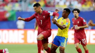 Soccer Football - FIFA World Cup 2026 - Group K - Colombia v Portugal - Miami Stadium, Miami Gardens, Florida, U.S. - June 27, 2026 Colombia's Jhon Arias in action with Portugal's Cristiano Ronaldo REUTERS/Paul Childs