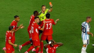 Soccer Football - FIFA World Cup 2026 - Quarter Final - Argentina v Switzerland - Kansas City Stadium, Kansas City, Missouri, U.S. - July 11, 2026 Switzerland's Breel Embolo is shown a red card by referee Joao Pinheiro after a VAR review REUTERS/Albert Gea