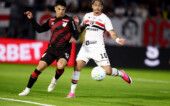 Soccer Football - Brasileiro Championship - Sao Paulo v Athletico Paranaense - Estadio Municipal Cicero De Souza Marques, Braganca Paulista, Brazil - July 22, 2026 Sao Paulo's Luciano in action with Athletico Paranaense's Lucas Esquivel REUTERS/Jean Carniel