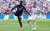 Soccer Football - FIFA World Cup 2026 - Round of 16 - United States v Belgium - Seattle Stadium, Seattle, Washington, U.S. - July 6, 2026 Folarin Balogun of the U.S. in action with Belgium's Brandon Mechele REUTERS/Albert Gea