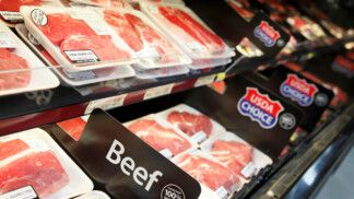 FILE PHOTO: Beef can be seen on display at a new Wal-Mart store in Chicago, January 24, 2012. The store will open on January 25, and it will be Wal-Mart's largest outlet in Chicago. REUTERS/John Gress (UNITED STATES)/File Photo