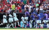 Soccer Football - FIFA World Cup 2026 - Quarter Final - France v Morocco - Boston Stadium, Foxborough, Massachusetts, U.S. - July 9, 2026 France's Ousmane Dembele celebrates scoring their second goal with teammates REUTERS/Winslow Townson