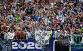 Soccer Football - FIFA World Cup 2026 - Semi Final - England v Argentina - Atlanta Stadium, Atlanta, Georgia, U.S. - July 15, 2026 Argentina fans display a banner with a message referencing the Falkland Islands as they celebrate after the match REUTERS/Paul Childs