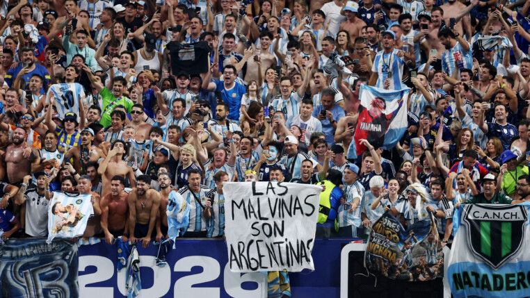 Soccer Football - FIFA World Cup 2026 - Semi Final - England v Argentina - Atlanta Stadium, Atlanta, Georgia, U.S. - July 15, 2026 Argentina fans display a banner with a message referencing the Falkland Islands as they celebrate after the match REUTERS/Paul Childs