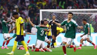 Soccer Football - FIFA World Cup 2026 - Round of 32 - Mexico v Ecuador - Estadio Azteca, Mexico City, Mexico - June 30, 2026 Mexico's Erik Lira and Cesar Montes celebrate their second goal scored by Raul Jimenez REUTERS/Raquel Cunha