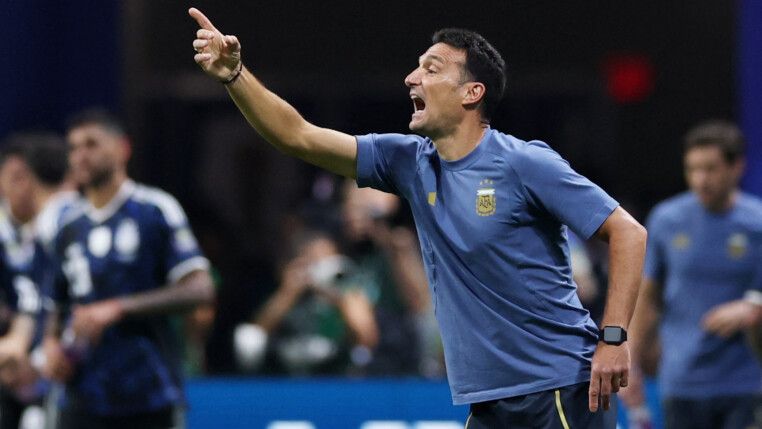 Soccer Football - FIFA World Cup 2026 - Semi Final - England v Argentina - Atlanta Stadium, Atlanta, Georgia, U.S. - July 15, 2026 Argentina coach Lionel Scaloni celebrates after Lautaro Martinez scores their second goal REUTERS/Paul Childs