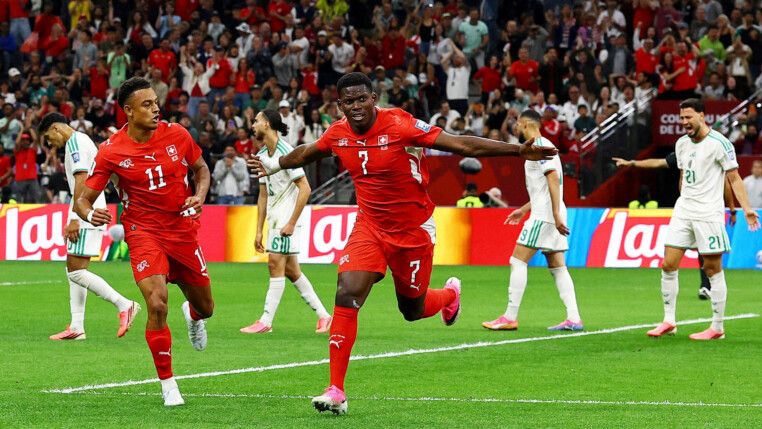 Soccer Football - FIFA World Cup 2026 - Round of 32 - Switzerland v Algeria - BC Place, Vancouver, Canada - July 2, 2026 Switzerland's Breel Embolo celebrates scoring their first goal with Dan Ndoye REUTERS/Agustin Marcarian TPX IMAGES OF THE DAY