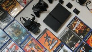 CDs e consolo do PLaystation